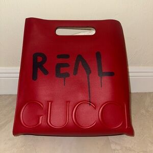 Red and dark blue Gucci bag